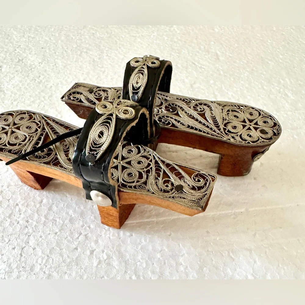Vintage Wooden Miniature Sandals with Intricate Silver Detailing